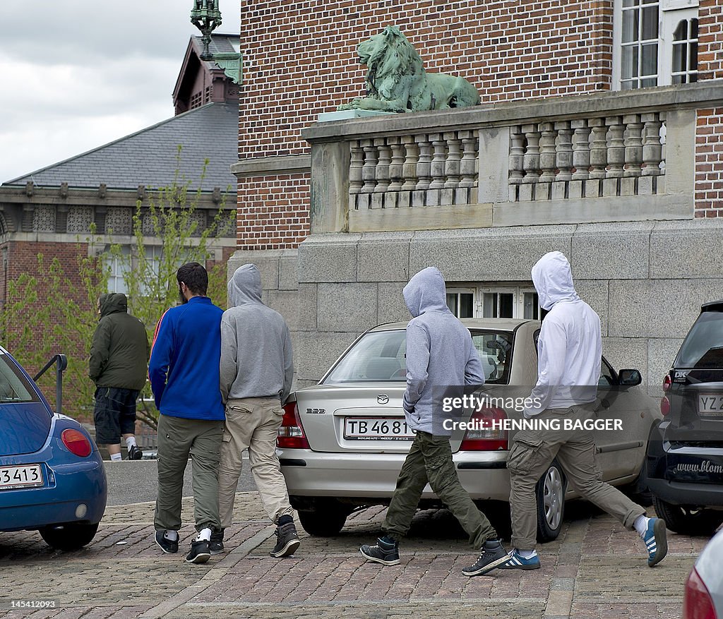 Somali men leave the court in Aarhus on 