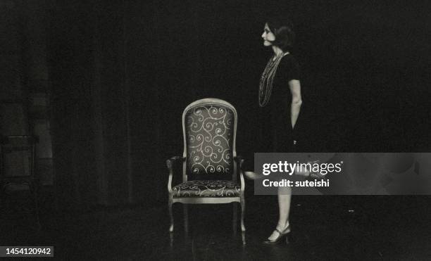 the waiting young woman. - vintage cinema sign stock pictures, royalty-free photos & images