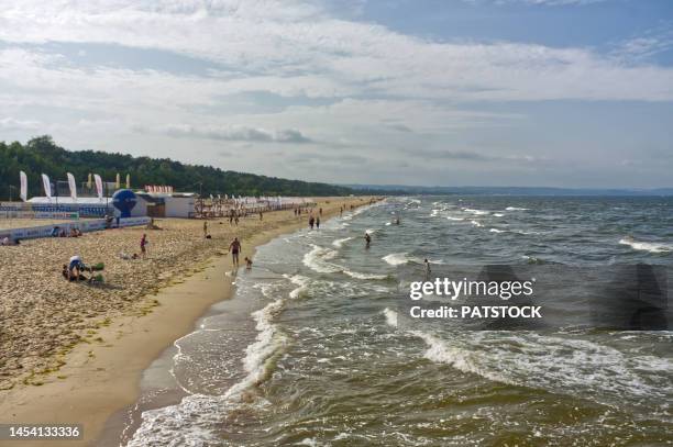 tourists at the beach. - danzig stock-fotos und bilder