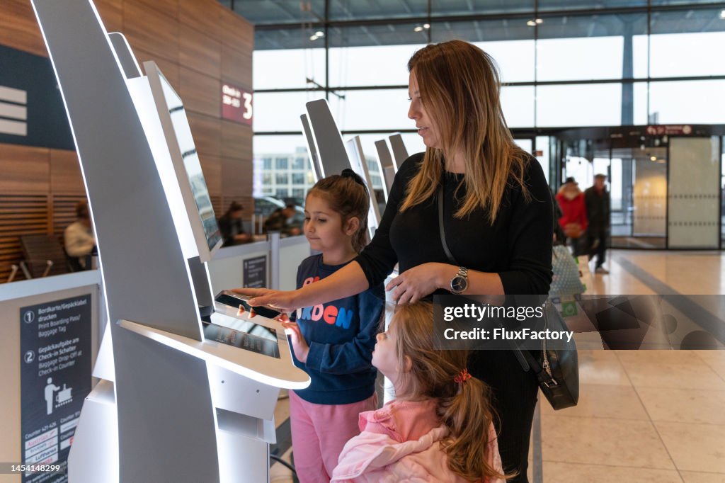 Self Checking Machine Woman Scanning Ticket Barcode On Mobile Phone On The Selfcheck Machine ...