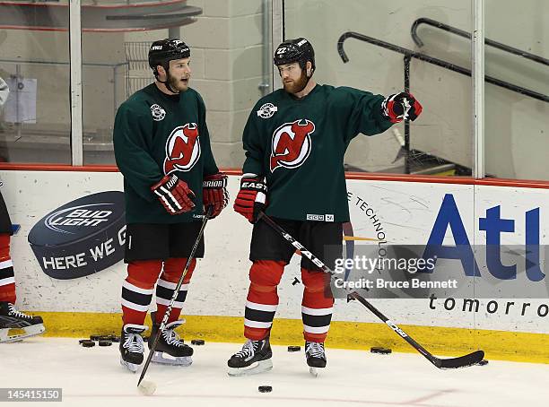 Cam Janssen and Eric Boulton of the New Jersey Devils take part in the media day skate at the AmeriHealth Pavilion the day prior to Game One of the...