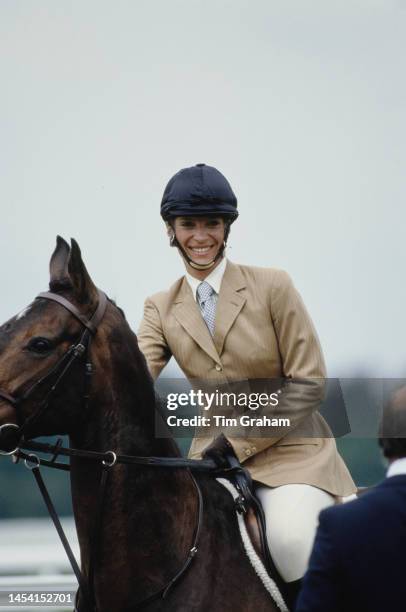 Princess Michael ff Kent smiles as she rides, unspecified, circa 1980s.