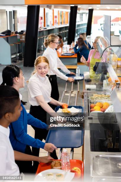 waiting in line - canteen stock pictures, royalty-free photos & images