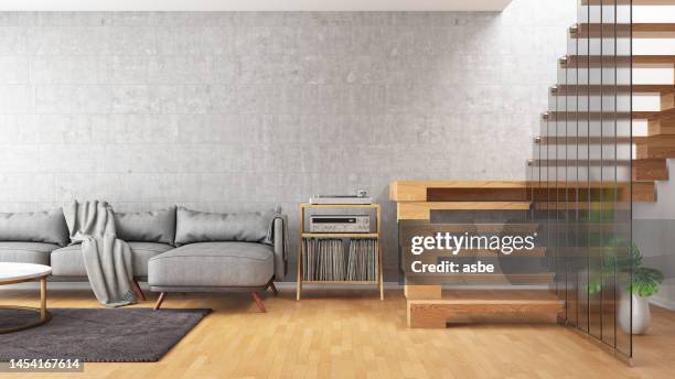 modern living room with stairs - mezzanine stockfoto's en -beelden