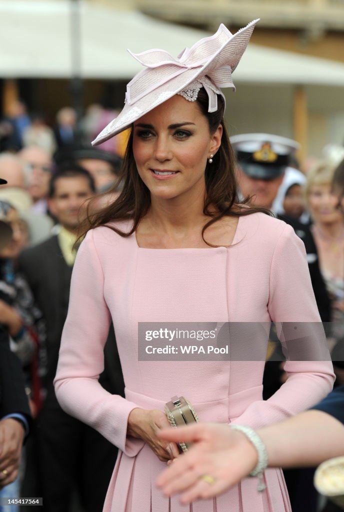 Queen Elizabeth II Hosts A Garden Party At Buckingham Palace