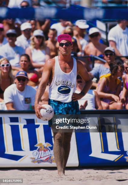 Volleyball player Karch Kiraly from the United States prepares to serve during the AVP Miller Lite Manhattan Beach Open on 11th August 1996 at...