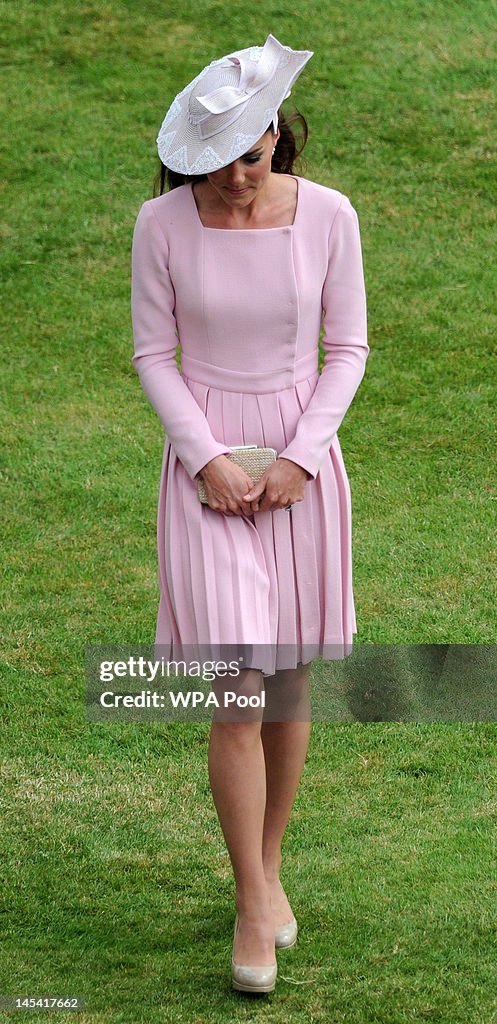 Queen Elizabeth II Hosts A Garden Party At Buckingham Palace