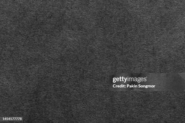 black paper sheet texture cardboard background. - grey suit fotografías e imágenes de stock