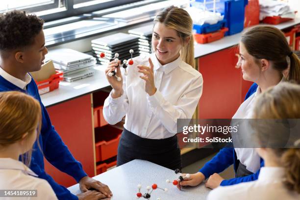 a group discussion in science - teenagers only stock pictures, royalty-free photos & images