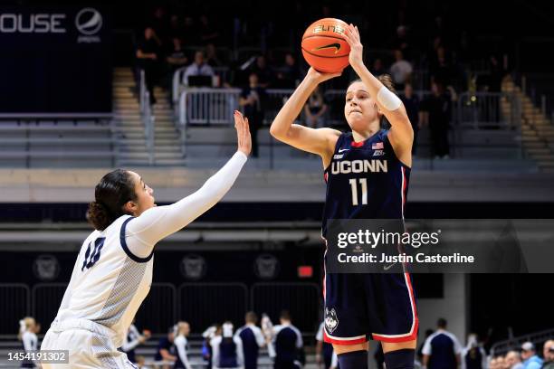 Lou Lopez Senechal of the UConn Huskies takes a shot over Trinity White of the Butler Bulldogs during the first half at Hinkle Fieldhouse on January...