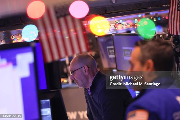 Traders work on the floor of the New York Stock Exchange during morning trading on January 04, 2023 in New York City. U.S. Stocks rose at the start...