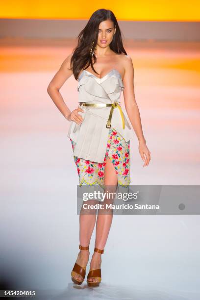 The model Irina Shayk walks the runway during Triton fashion show at Sao Paulo Fashion Week Summer 2014/2015 SPFW on April 1, 2014 in Sao Paulo,...