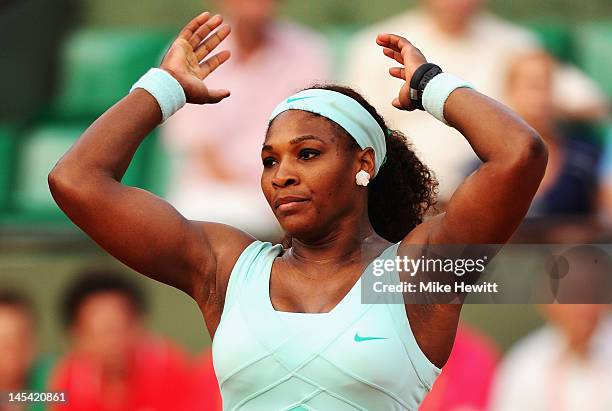 Serena Williams of USA shows her frustration during her women's singles first round match between Serena Williams of USA and Virginie Razzano of...