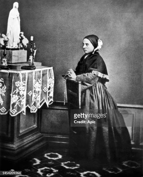 Bernadette Soubirous famous for seeing Virgin Mary apparitions in a cave in Lourdes in 1858.
