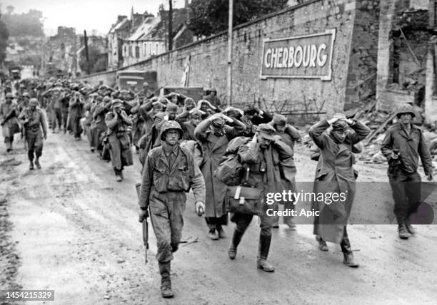 Invasion of Normandy, late june 1944 : german soldiers prisoners of american soldiers in Cherbourg.