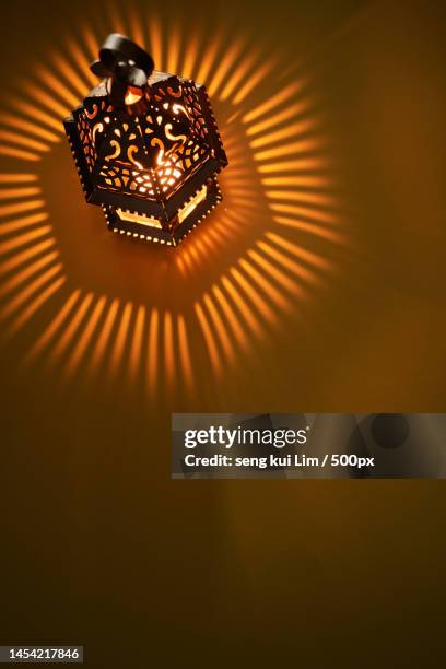 arabic lantern with light rays greeting card for muslim community holy month ramadan kareem,malaysia - ramadan foto e immagini stock