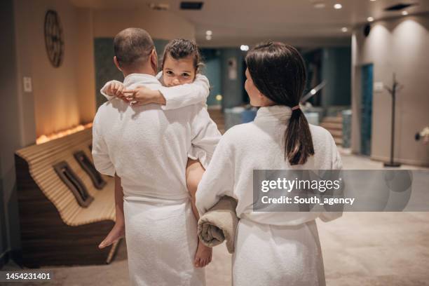 family in hotel spa - kuuroord stockfoto's en -beelden