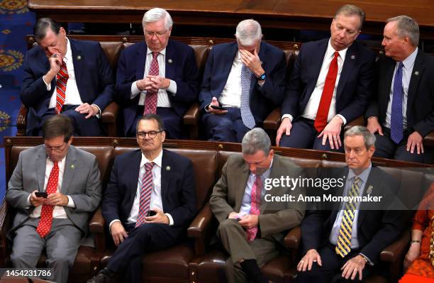 Lawmakers wait to cast their votes in the House Chamber during the second day of elections for Speaker of the House at the U.S. Capitol Building on...