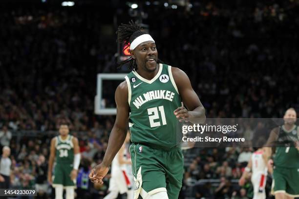 Jrue Holiday of the Milwaukee Bucks reacts to a score during a game against the Washington Wizards at Fiserv Forum on January 03, 2023 in Milwaukee,...