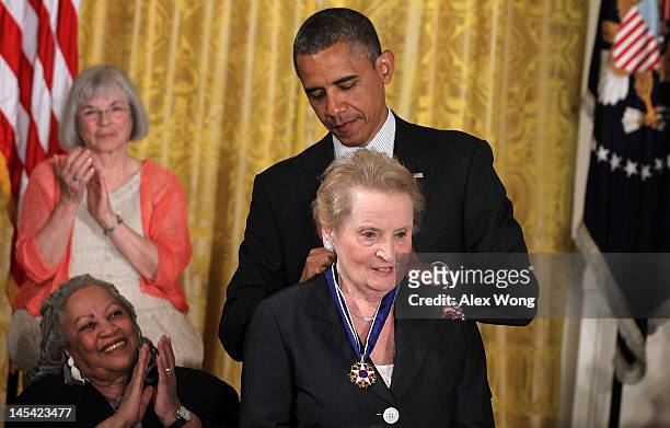 Former U.S. Secretary of State Madeleine Albright is presented with a Presidential Medal of Freedom by U.S. President Barack Obama during an East...