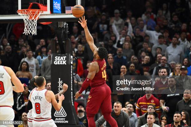Donovan Mitchell of the Cleveland Cavaliers shoots during overtime against the Chicago Bulls at Rocket Mortgage Fieldhouse on January 02, 2023 in...