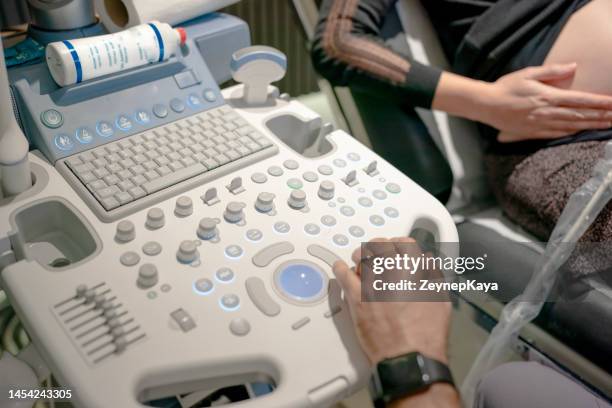 ultrasound scan device in gynecology clinic - diagnostic medical tool stock pictures, royalty-free photos & images