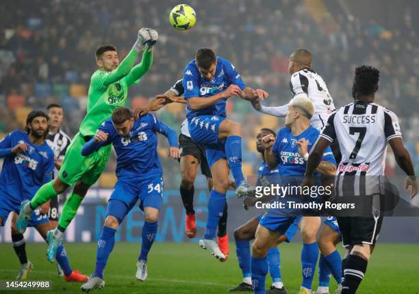Goalkeeper Guglielmo Vicario of Empoli FC defends a cross into the penalty area during the Serie A match between Udinese Calcio and Empoli FC at the...