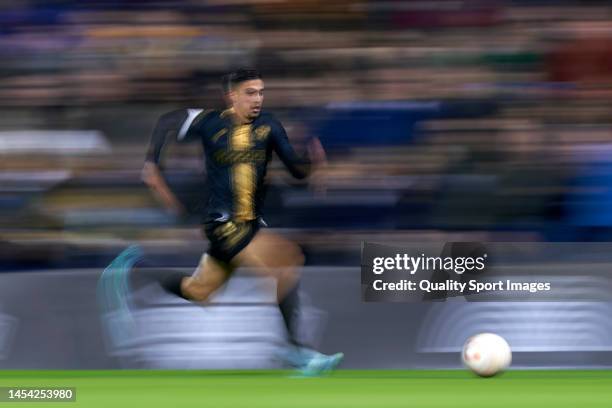 Cristo Romero of Intercity runs with the ball during the Copa Del Rey Round of 32 match between Intercity and FC Barcelona at Estadio Jose Rico Perez...