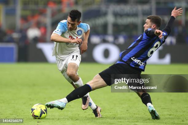 Hirving Lozano of SSC Napoli is challenged by Robin Gosens of FC Internazionale during the Serie A match between FC Internazionale and SSC Napoli at...