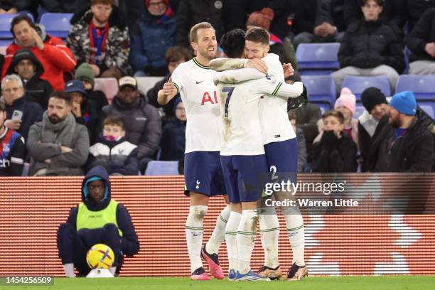 Matt Doherty of Tottenham Hotspur celebrates with teammates after scoring the team's third goal during the Premier League match between Crystal...