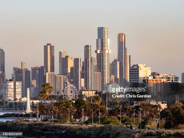 urban skyline at sunrise - melbourne star stock pictures, royalty-free photos & images
