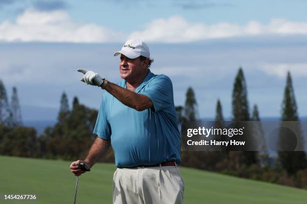 Chris Berman, ESPN sportscaster, gestures on a green during the pro-am prior to the Sentry Tournament of Champions at Plantation Course at Kapalua...