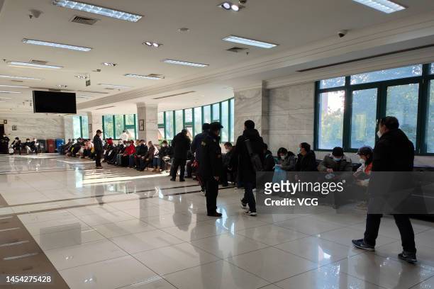 People wait for funeral service for their deceased relatives at Baoxing Funeral Parlor on January 4, 2023 in Shanghai, China.