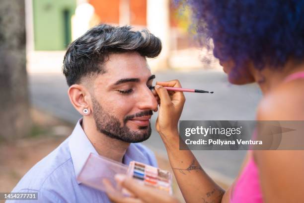 carnaval makeup outdoors - man make up stock pictures, royalty-free photos & images