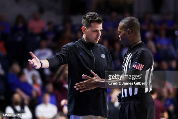 Head Coach Todd Golden talks to an official during the first half of a game against the Texas A&M Aggies at the Stephen C. O'Connell Center on...