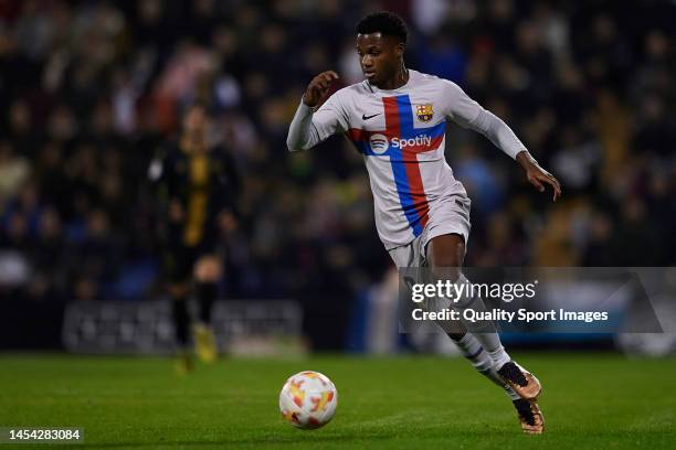 Ansu Fati of FC Barcelona runs with the ball during the Copa Del Rey round of 32 match between CF Intercity and FC Barcelona at Estadio Jose Rico...