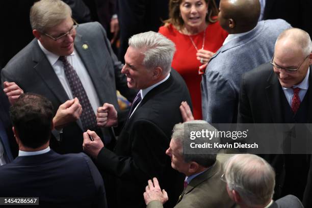 House Republican leader Kevin McCarthy reacts with fellow Republicans in the House Chamber following a day of votes for the new Speaker of the House...