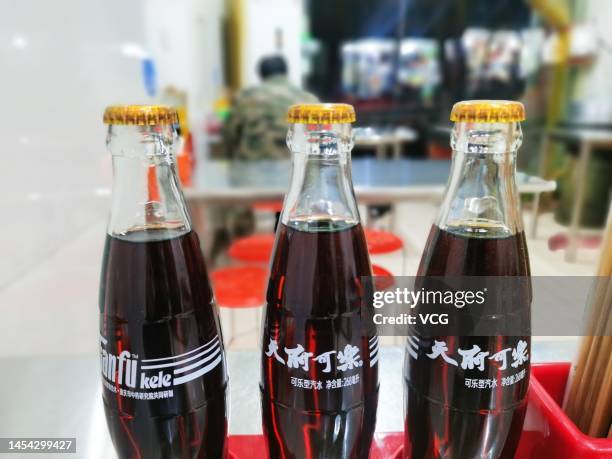 Chinese Coke Rip Off 1,802 China Coke Stock Photos, High-Res Pictures, and Images - Getty Images