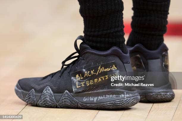 Detail of Kyrie Irving of the Brooklyn Nets shoes against the Chicago Bulls during the second half at United Center on January 04, 2023 in Chicago,...