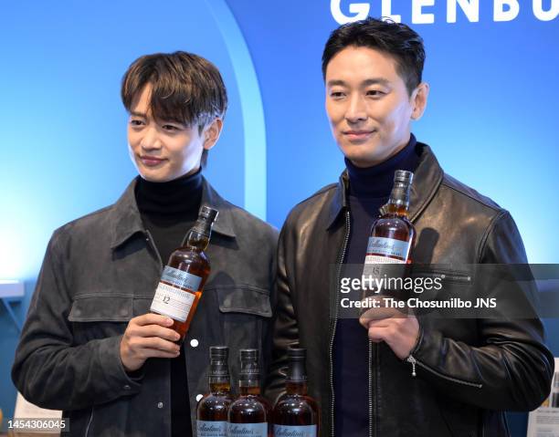South korean singer Minho of SHINee and actor Ju Ji-Hoon attend the photocall for Ballantine's Single Malt Glenburgie Station Opening at Gourmet 494...