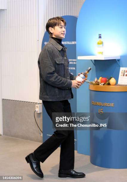 South korean singer Minho of SHINee attends the photocall for Ballantine's Single Malt Glenburgie Station Opening at Gourmet 494 on December 21, 2022...