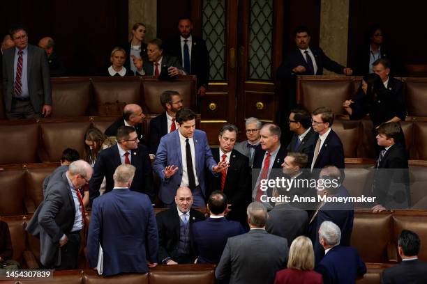 Rep.-elect Matt Gaetz talks to fellow members-elect during the second day of elections for Speaker of the House at the U.S. Capitol Building on...