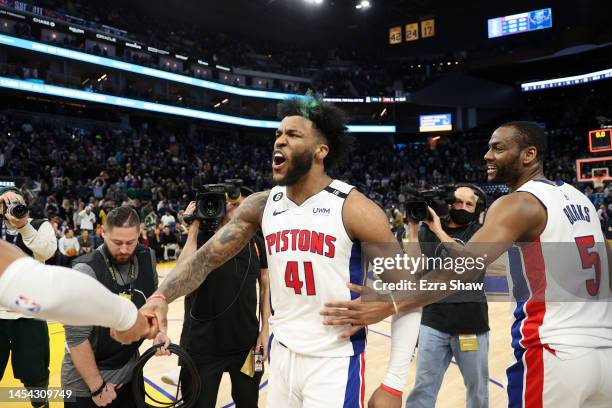 Saddiq Bey of the Detroit Pistons reacts after he made a three-point basket at the buzzer to beat the Golden State Warriors at Chase Center on...