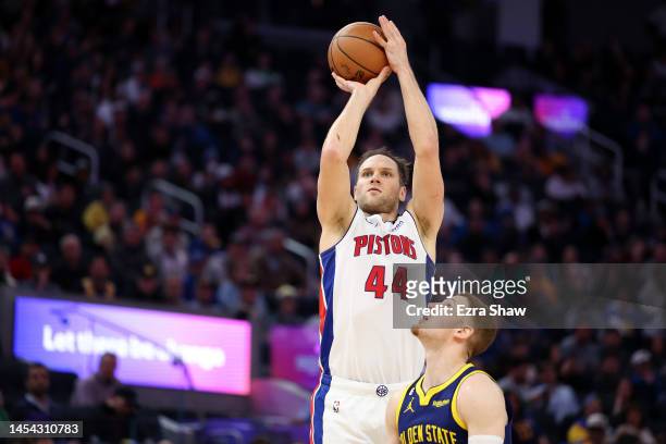 Bojan Bogdanovic of the Detroit Pistons shoots over Donte DiVincenzo of the Golden State Warriors in the second half at Chase Center on January 04,...