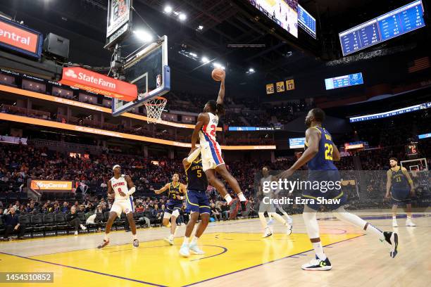 Isaiah Stewart of the Detroit Pistons goes up for a dunk on Kevon Looney of the Golden State Warriors in the second half at Chase Center on January...