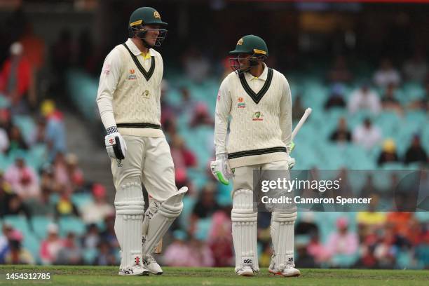 Matt Renshaw and Usman Khawaja of Australia talk between wickets during day two of the Second Test match in the series between Australia and South...