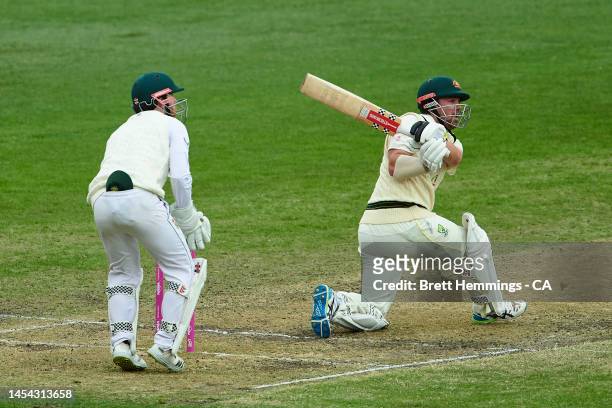 Travis Head of Australia bats during day two of the Second Test match in the series between Australia and South Africa at Sydney Cricket Ground on...