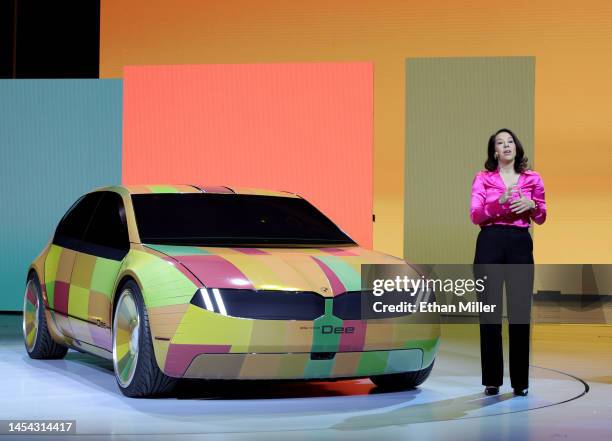 Project manager Stella Clarke introduces the color-changing ability of the BMW i Vision Dee concept EV sport sedan during a keynote address by...