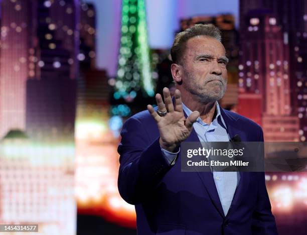 Actor Arnold Schwarzenegger speaks during a keynote address by Chairman of the Board of Management of BMW AG Oliver Zipse at CES 2023 at The Pearl...