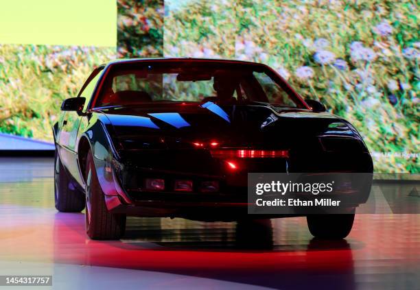 Pontiac Trans Am from the television series "Knight Rider" drives onstage during a keynote address by Chairman of the Board of Management of BMW AG...